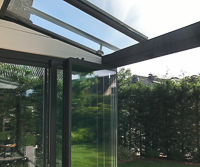 Terrassendach Serie Heroal CR mit Glas-Schiebe-Dreh-System SF 25 und KADECO Wintergartenmarkise